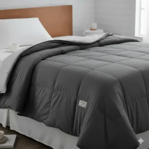 Grey glass-bead weighted blanket draped over a bed to show texture and depth for better winter sleep.