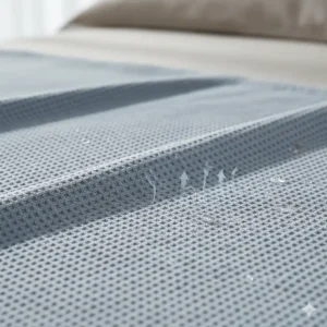 Close-up of breathable bamboo fabric weave used in cooling blankets to wick away moisture.